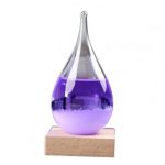 Vaso di galleggiamento con liquido viola, oggetto decorativo scientifico, perfetto per esposizioni e decorazioni educative, su base di legno.