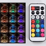 Vaso luminoso con LED colorati e telecomando, perfetto come decorazione scientifica e oggetto di design innovativo.