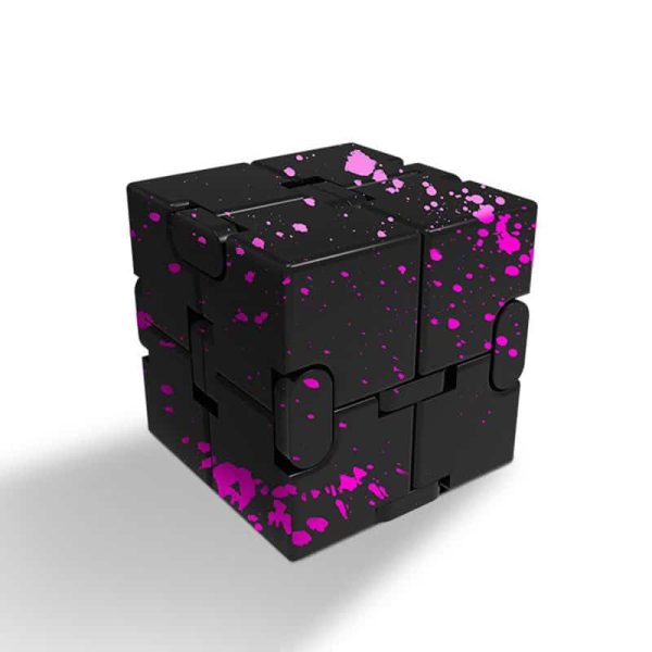 Cubo magnetico nero con schizzi rosa fluorescente, oggetto decorativo scientifico, perfetto per appassionati di scienza e design innovativo.