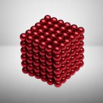 Modello 3D di un cubo composto da sfere rosse lucide, simbolo di scienza e tecnologia, ideale come decorazione scientifica o oggetto da collezione.