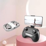 Drone con videocamera e controller compatibile con smartphone, ideale per riprese aeree e fotografia.