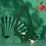 Lampada decorativa in stile minimalista con design ispirato alla natura e alla cultura giapponese, ideale per creare atmosfere eleganti e raffinate in ambienti moderni e di design.