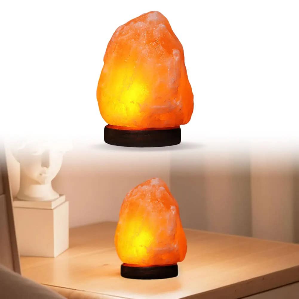 Lampada di sale Himalaya con base in legno Lampada di sale Himalaya con luce calda e base in legno naturale.