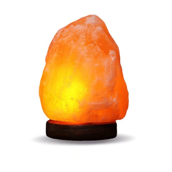 Lampada di sale rosa dell'Himalaya, illuminata, perfetta come decorazione e fonte di luce rilassante.