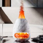 Vaporizzatore di pietre di sale in stile moderno con effetto fumo e luce calda, decorazione originale per ambienti domestici e uffici.