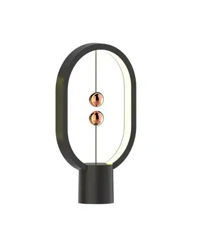 Lampada decorativa con design moderno a forma di ovale, dotata di LED colorati e magneti al neodimio, ideale come oggetto decorativo scientifico e originale.