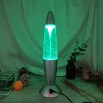 Lampada lava LED con bolle luminose, decorazione scientifica moderna, ideale per ambienti innovativi e studi scientifici, con luce blu e movimento delle bolle.