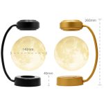 Luce da tavolo ispirata alla luna, con supporto nero e dorato, altezza di 260mm e diametro di 140mm, perfetta come decorazione scientifica e oggetto di design per ambienti moderni.