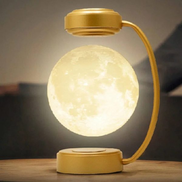 Lampada decorativa a forma di Luna con luce calda, perfetta per ambienti moderni e scientifici, creando un'atmosfera suggestiva e innovativa.