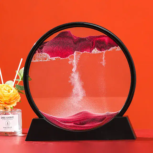 Vortice di sabbia colorata in scatola di vetro, decorazione scientifica e oggetto di design, ideale per ambienti moderni e studi scientifici.