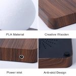 Pannello di base in legno con superficie in materiale PLA e design antiscivolo, dotato di ingresso di alimentazione e dettagli estetici eleganti.