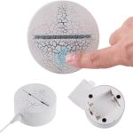 Pulsante touch e base di ricarica senza fili.