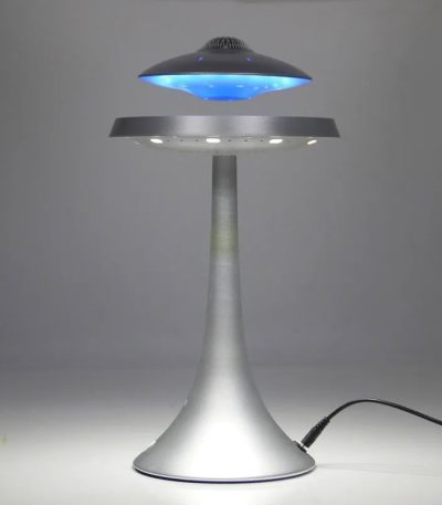 Piantana decorativa con luce LED blu, ispirata a oggetti scientifici, perfetta per ambienti moderni e studi scientifici, con design innovativo e tecnologia avanzata.