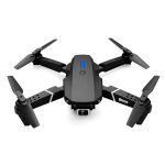 Drone nero con quattro eliche, design compatto e moderno, perfetto per riprese aeree e fotografia, con telecamera integrata.