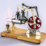 Motore a vapore in miniatura con ingranaggi e cilindri, perfetto come decorazione scientifica o oggetto da collezione.