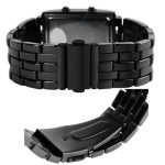 Orologio da polso scientifico nero con cinturino in metallo e quadrante digitale, ideale come decorazione o oggetto da collezione scientifica.