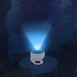 Vaso luminoso con proiezione di stelle che crea un'atmosfera magica e rilassante, ideale per decorazioni scientifiche e ambienti di studio o relax.