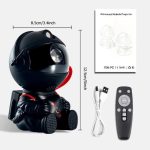 Figura di astronauta in miniatura con casco, telecomando, cavo USB e scheda illustrativa, perfetta come decorazione scientifica o oggetto da collezione.