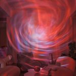 Vortice di luci colorate che crea un effetto visivo suggestivo e coinvolgente, ideale come decorazione per ambienti moderni e creativi.