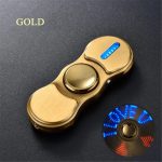 Fidget spinner con design scientifico dorato e LED luminoso, ideale come decorazione e oggetto di relax. Perfetto per appassionati di scienza e collezionisti di gadget innovativi.