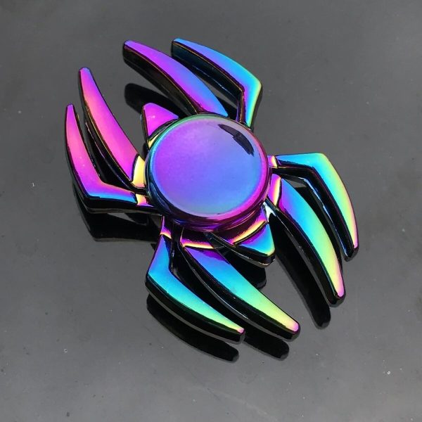 Vassoio decorativo a forma di ragno con finitura iridescente, perfetto come oggetto scientifico o decorativo. Design moderno e colorato, ideale per appassionati di scienza e decorazioni originali.