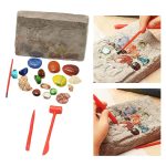 Set di pietre colorate e strumenti per creare mosaici scientifici, ideale per decorazioni e progetti educativi. Include pietre di varie forme e strumenti di precisione.
