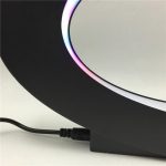 Pannello luminoso con anello LED RGB, ideale come decorazione scientifica o per ambienti creativi, con luce regolabile e design moderno.