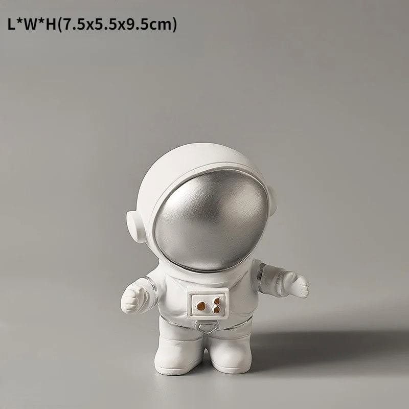 Oggetto decorativo astronauta in miniatura Figura decorativa astronauta in stile scientifico, realizzata in materiali di alta qualità, ideale come oggetto da collezione o decorazione per ambienti a tema spaziale.