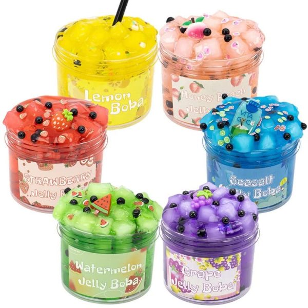 Vasetti di Lava Boba Gelée in vari colori con frutta e decorazioni, perfetti come decorazioni scientifiche o oggetti da collezione, ideali per appassionati di scienza e decorazioni originali.