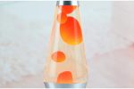 Vaso lava lava con bolle di colore arancione, decorazione scientifica originale, perfetta per appassionati di scienza e decorazioni innovative.