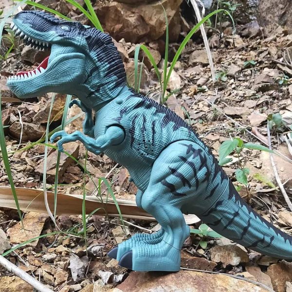 Modello di dinosauro T-Rex in plastica blu, perfetto come oggetto decorativo scientifico o giocattolo educativo, con dettagli realistici e articolazioni mobili.