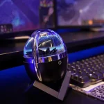 Mini proiettore di galassie con luci LED, ideale per decorazioni scientifiche e ambienti rilassanti, con design compatto e moderno.