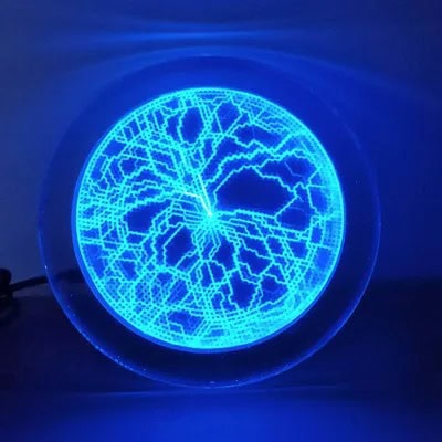 Orologio LED con design di circuito elettrico illuminato in blu, perfetto come decorazione scientifica moderna e originale.
