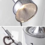 Luci da tavolo scientifiche in stile moderno con finitura in metallo lucido, ideali come decorazioni per ambienti di studio o ufficio, combinano funzionalità e design innovativo.