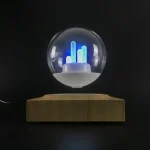 Vaso di cristallo con LED scientifico blu acceso, decorazione moderna e innovativa per ambienti scientifici o studi di design.