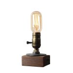 Lampada Edison vintage con filamento visibile e base in legno naturale, perfetta come decorazione originale e retrò per ambienti domestici o uffici.