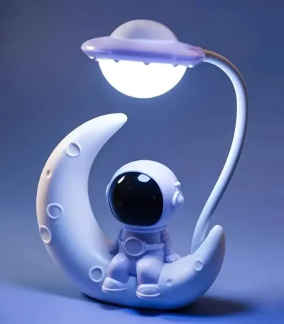 Oggetto decorativo astronauta e luna con luce LED.