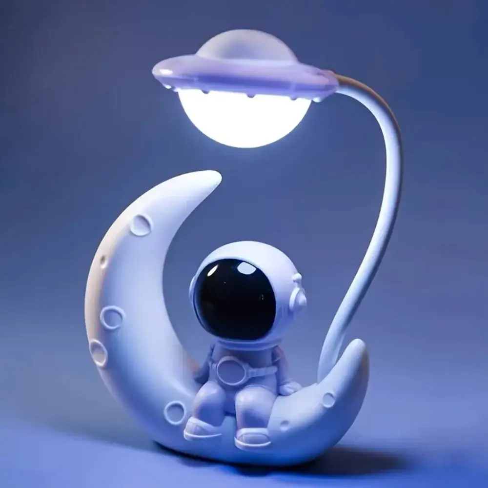 Oggetto decorativo astronauta e luna con luce LED.