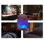 Lampi di sale rosa dell'Himalaya con luce LED blu, ideali come decorazioni per ambienti rilassanti e wellness. Perfetti per creare atmosfere calmanti in casa o spa, con un design naturale e elegante.