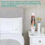Lampada a lava con luci colorate e riflessi arcobaleno, crea un'atmosfera rilassante e accogliente in ogni stanza. Perfetta come decorazione e fonte di luce soffusa.