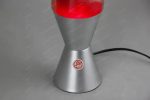 Vaso di nebbia scientifico con base in metallo e copertura rossa, ideale come decorazione scientifica o oggetto da collezione.