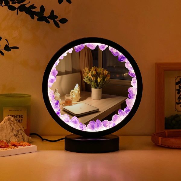 Specchio decorativo con luci LED viola e cornice di cristalli colorati.