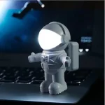 Luminoso decorativo a forma di astronauta, perfetto come oggetto di arredamento scientifico e decorativo, con luce integrata che crea un effetto suggestivo.