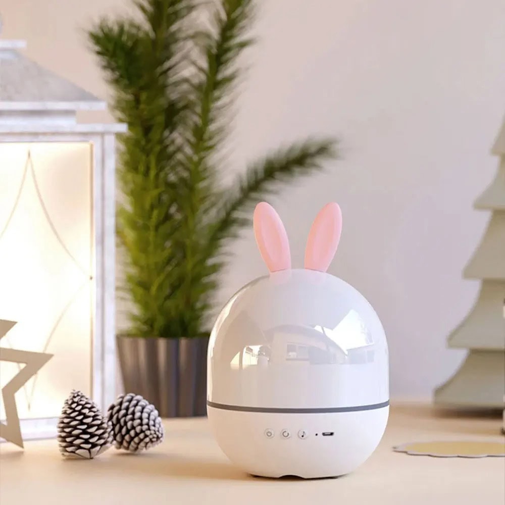 Diffusore di aromi a forma di uovo con orecchie da coniglio Diffusore di aromi a forma di uovo con orecchie da coniglio, ideale come decorazione scientifica e oggetto di design per ambienti domestici e uffici.