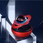 Oggetto decorativo scientifico con sfera orbitale in vetro trasparente e base rossa, ispirato ai modelli di sistemi planetari e cosmologia, perfetto come decorazione da scrivania o collezione.