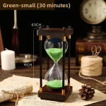 Vaso a clessidra con sabbia verde, decorazione scientifica, oggetto decorativo per appassionati di scienza e design, misura 19 cm di altezza e 8,5 cm di diametro.