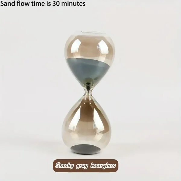 Sabbia in vetro a clessidra color grigio fumé, decorativa e funzionale, perfetta per misurare il tempo in modo elegante e originale.