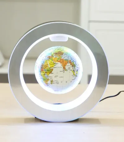 Globo terrestre illuminato con luce LED, oggetto decorativo scientifico per ambienti moderni e studi.