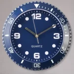 Orologio da parete scientifico con quadrante blu e dettagli in argento, perfetto come decorazione per ambienti di studio o laboratorio.