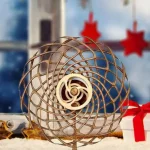 Pallone di Newton in legno con spirale centrale, oggetto decorativo scientifico per appassionati di fisica e scienza, ideale come regalo originale e decorazione da scrivania.